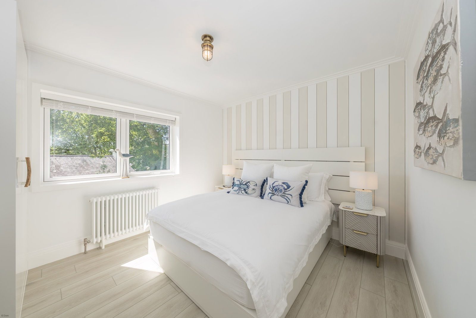 Second king-size bedroom with a calm palette
